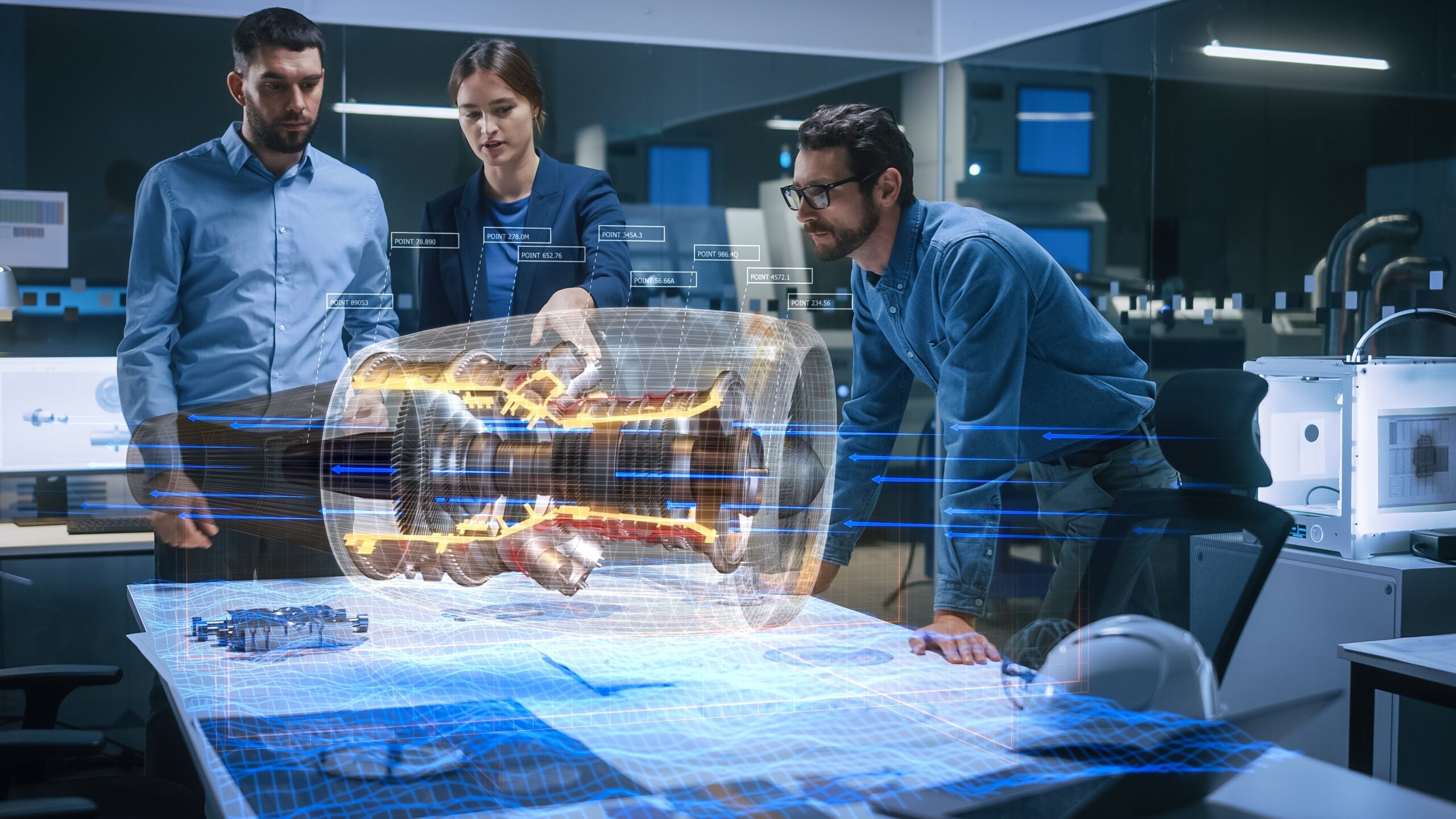 Three engineers examine a holographic engine model in a high-tech lab, discussing its design and data points, showcasing innovative technology.